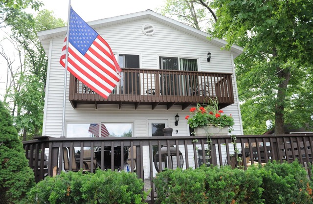 Roomy three bedroom two bath private home with lake view/access. ORV friendly!