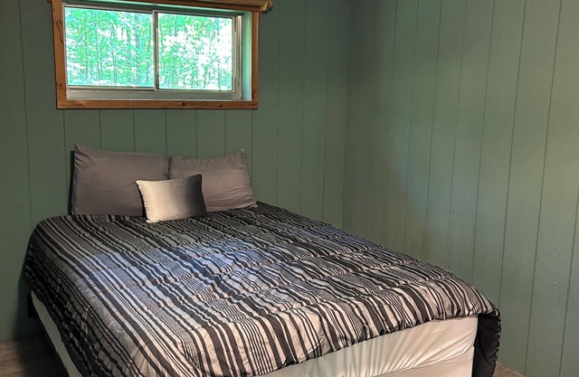 Rustic cabins in secluded campground with lake access and woods to wander in.