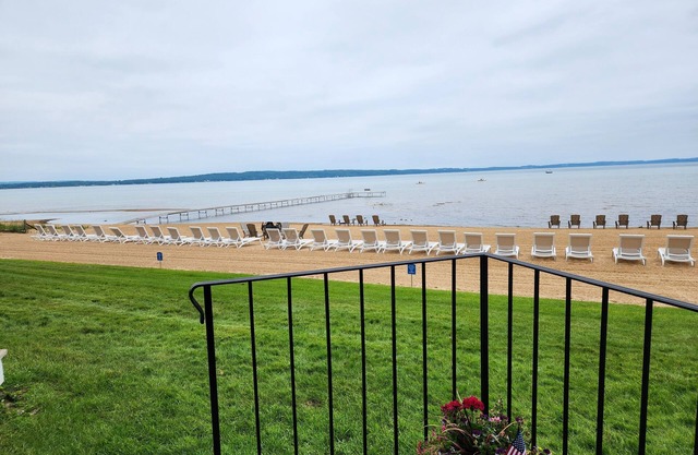 Sandy Beach! Pool, air conditioning. Traverse City studio condo on the Bay