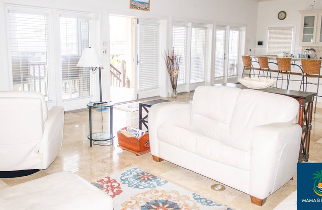 Seaside Serenity Waterfront Cottage with Boatlift and Elevator