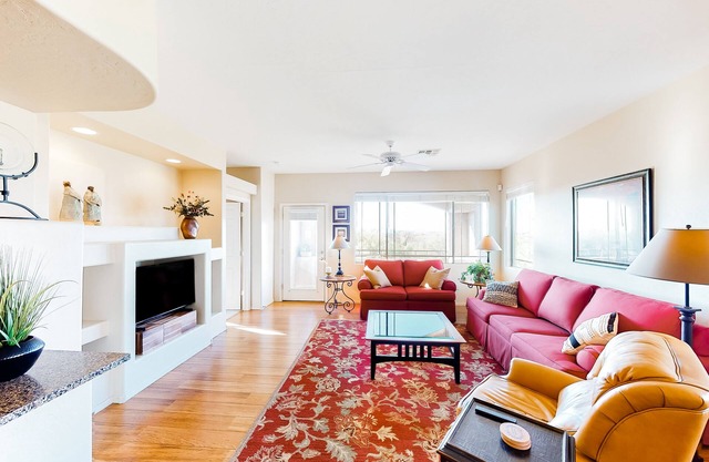 Serene mountain view condo with balcony, patio, washer/dryer, & board games