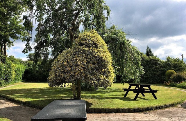 Shaw House is a lovely property offering a large garden.