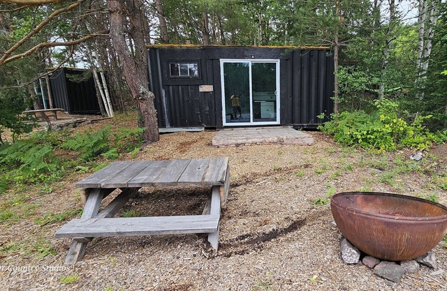 Shipping contain conversion into cozy copper Country cabin!!