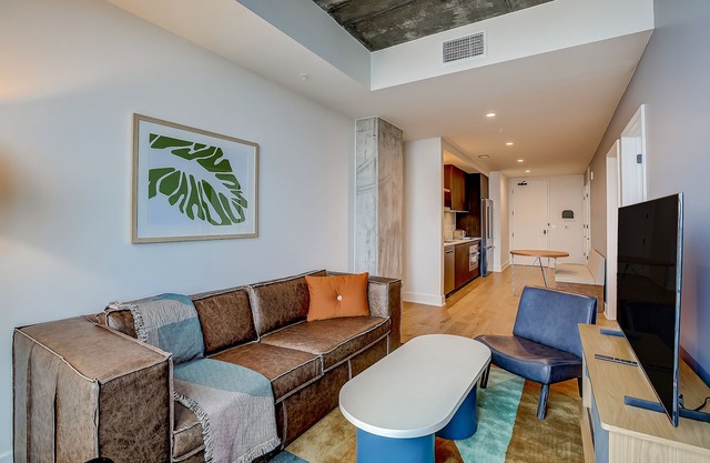Sleek 15th-Floor Condo with Rooftop Pool, WiFi, Central AC, and Great Location