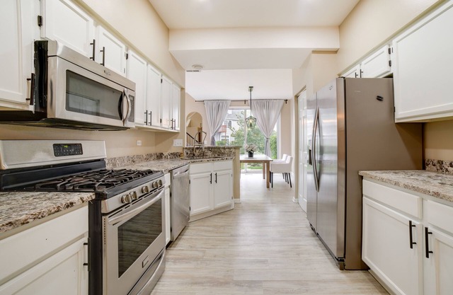 Sleek + Modern Lombard Townhome w/Pond View!