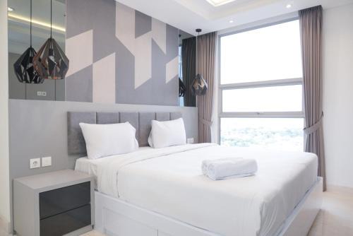 Spacious and Elegant 2BR Apartment at The Kencana Residence By Travelio