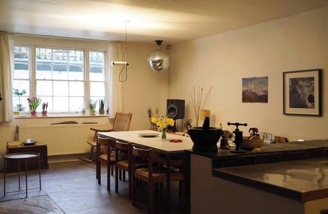 Spacious bedroom in characterful period flat.