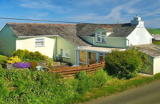 Spacious farmhouse with large childrens play area and fabulous family kitchen.
