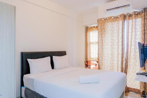 Spacious Studio Akasa Pure Living Apartment BSD By Travelio