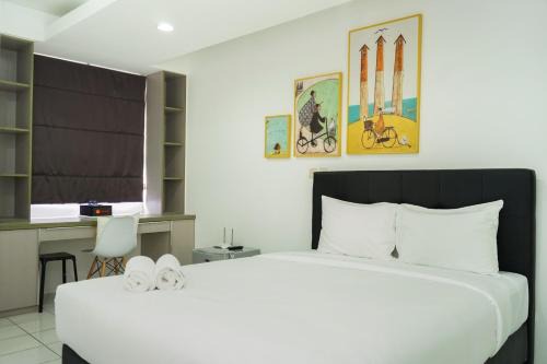 Spacious Studio Room Menteng Square Apartment By Travelio
