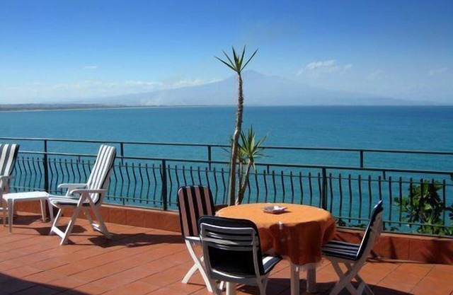 spectacular location directly above the sea, incredible view of the sea, Etna .