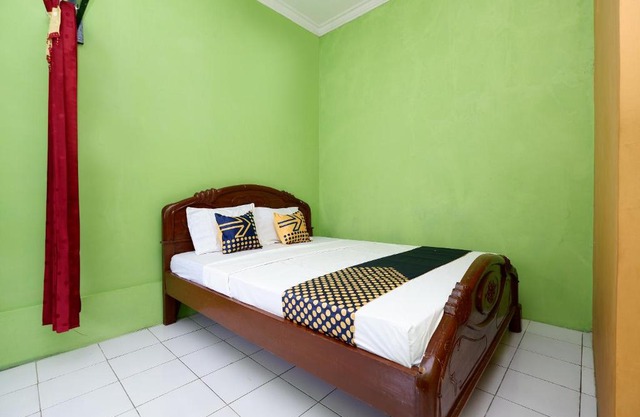 SPOT ON 2106 Homestay Flamboyan