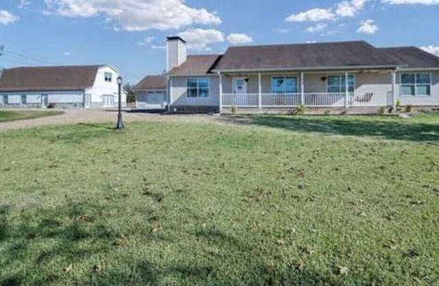 Sprawling family farmhouse in a beautiful spacious country setting.