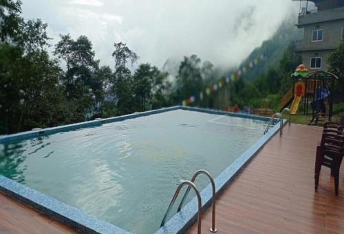 Staynest Z Resort Gangtok - swimming pool #gym #BAR #garden #parking