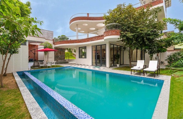 StayVista's The Tree House - City-Center Villa with Outdoor Pool, Spacious Balconies & Vast Lawn