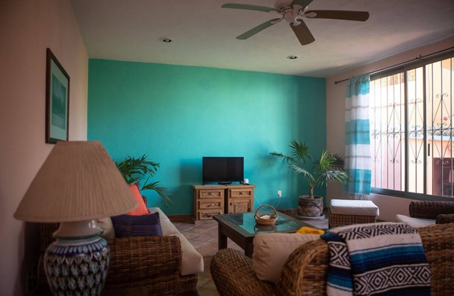 Steps to the beach with a rooftop ocean view.