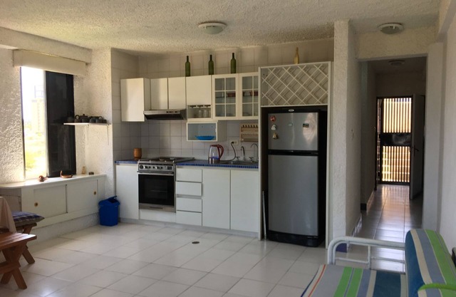 Studio apartment in front of C.Cial La Vela, near the beach, with swimming pool and 24 hour security.