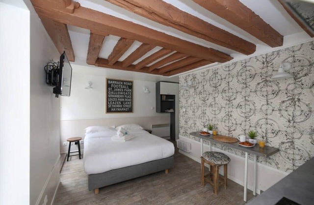 Studio parisien 20m2 en face du musee Grevin - 2P