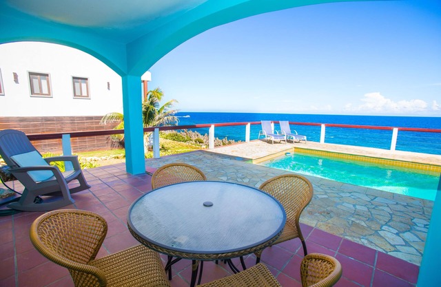 Stunning Coral View Home with Oceanfront Pool by RedAwning