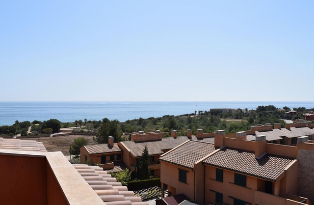 Stunning Duplex with Pool, Solarium, and Parking Near Beautiful Coves