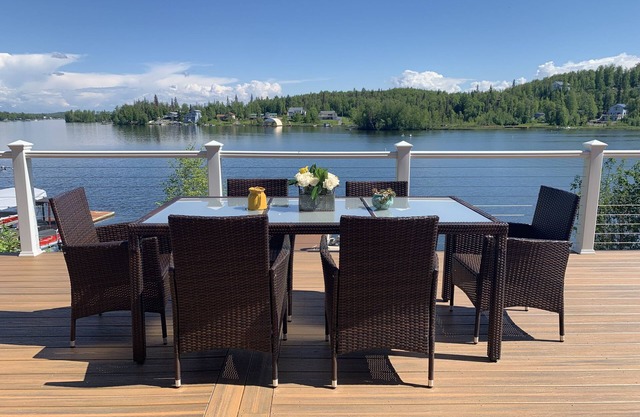Stunning lake retreat with gorgeous deck, lakeside hot tub & spacious rec room.