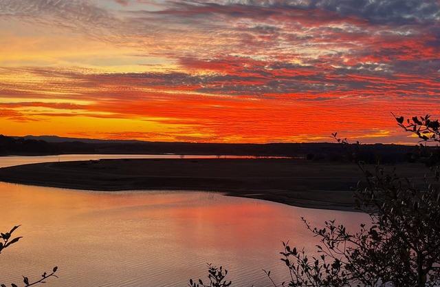 Stunning lakefront home with balcony, AC, W/D, & incredible views