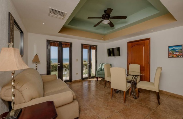 Stylish 1BR Condo with Terrace & Direct Ocean Views