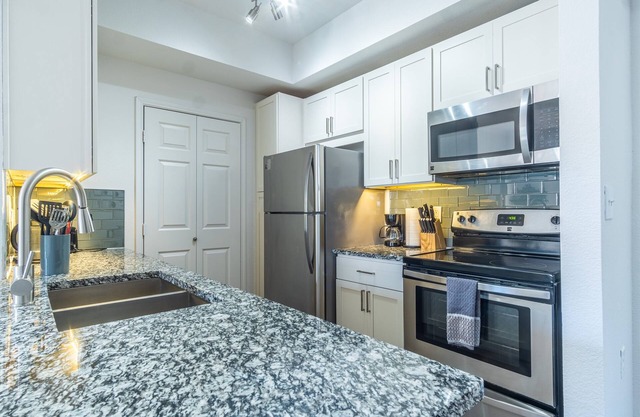Stylish 1BR Suite | Gym, Pool Access & Parking