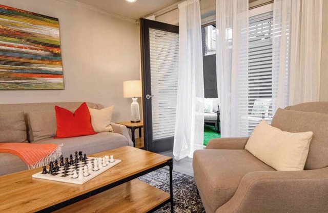 Stylish 2-bed, 1 1/2 bath retreat in Central Dallas with private patio, pool access, and award-winning courtyard.