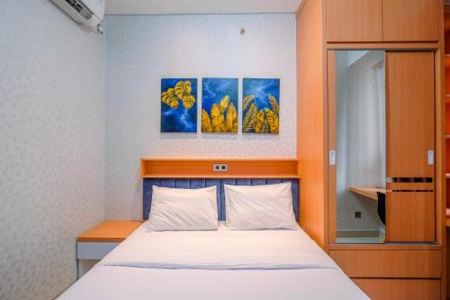 Stylish and Comfy 2BR at Transpark Cibubur Apartment By Travelio
