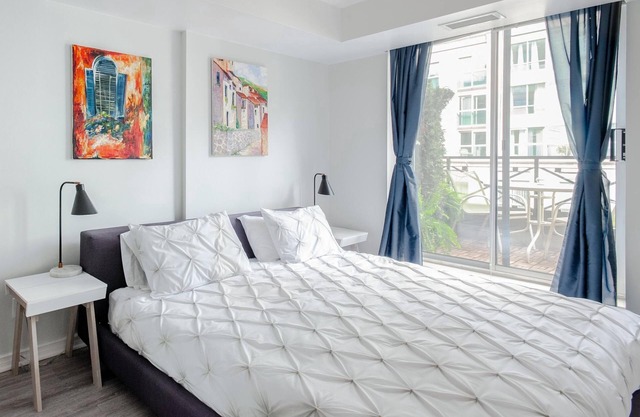 Stylish downtown apartment with private patio and parking
