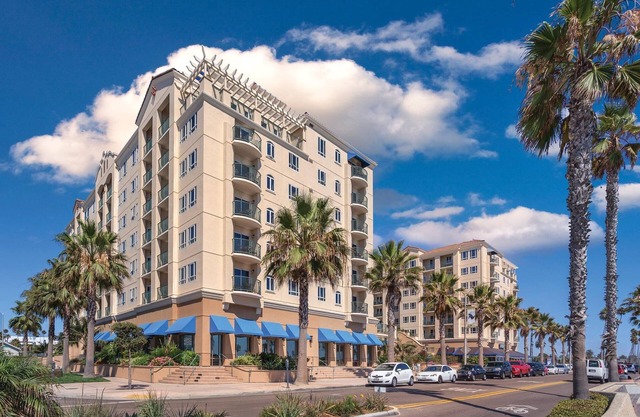 Surf at wonderful Oceanside right across from beach with pool & views.