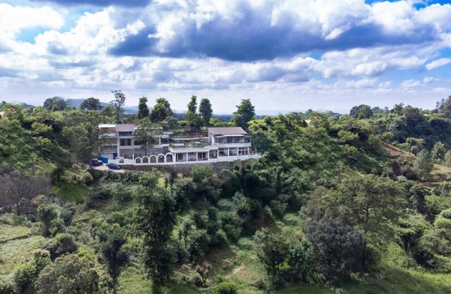 The Blue Door - A Rustic Art Deco Boutique Villa with stunning views