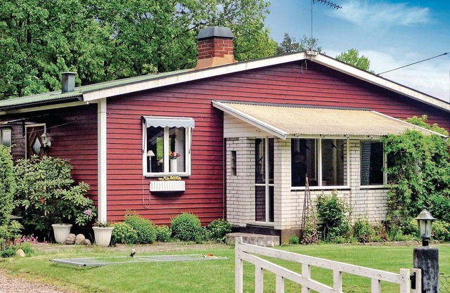 The cottage has a large garden and a glazed balcony with an open fireplace.