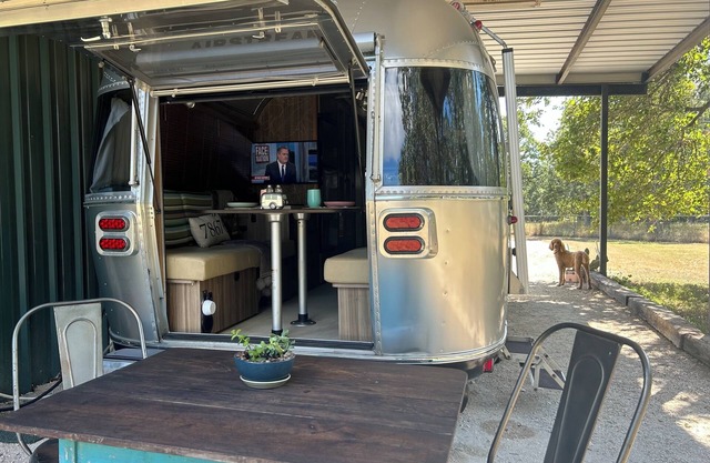 The Hama a Tommy Bahama Airstream on a small Horse Farm with a Pool