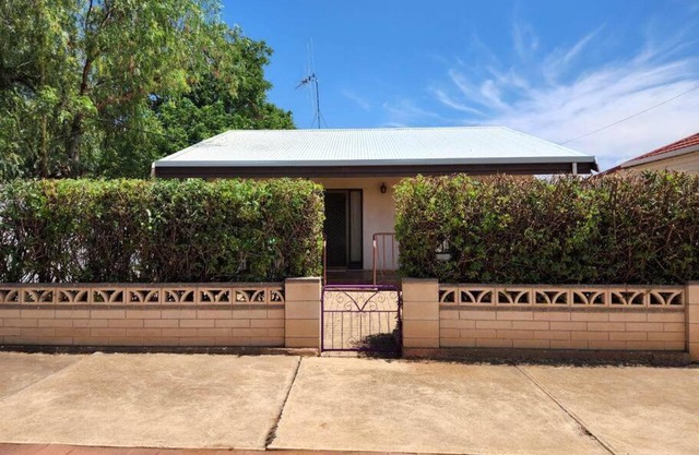 The House with the Purple Gate