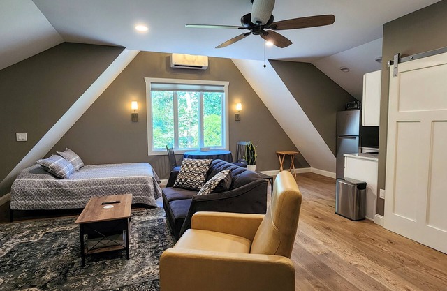 "The Nest" is a unique hideaway in the woods with convenient access.