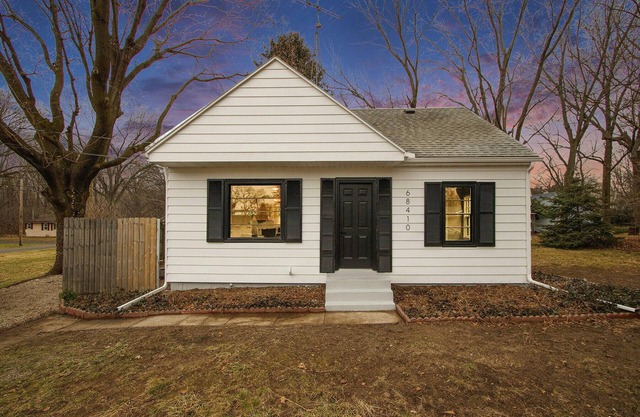 This 4 bed/1 bath home is less than a block from the lake in Sister Lakes.