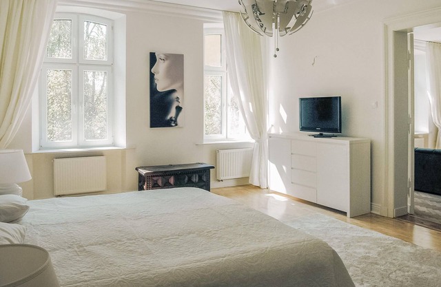 This large, modern vacation apartment is located in a renovated residential building.