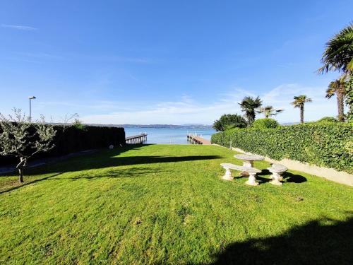 Trilocale Sporting con giardino privato e WiFi - Sunset Beach