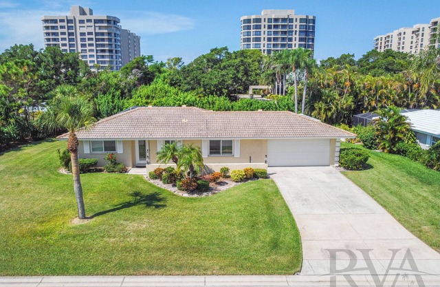 Tropical Escape–Private Pool Home Near the Sand Hy Tee on Longboat Key by RVA