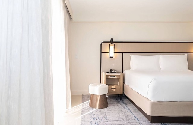 Tropical Retreat: Spacious Room with Stunning City View | Pets Are Allowed