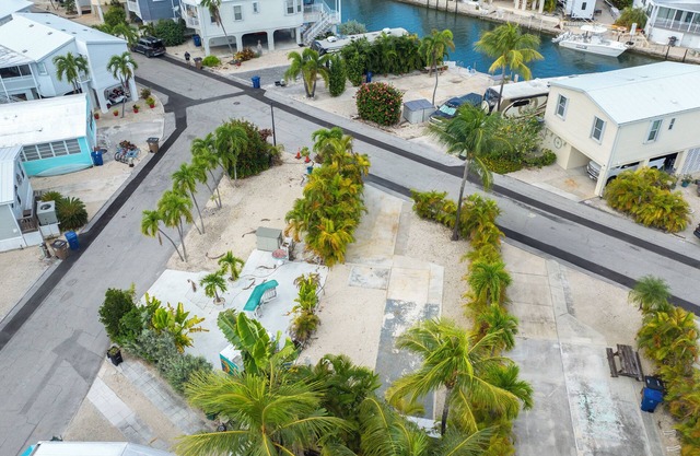 Tropical RV Lot Oasis in the Florida Keys with Paved Patio, Full Hookups & Palm-Tree Privacy