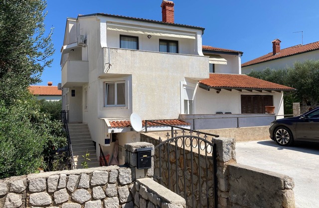 Two bedroom apartment with air-conditioning Mali Lošinj, Lošinj (A-23520-a)