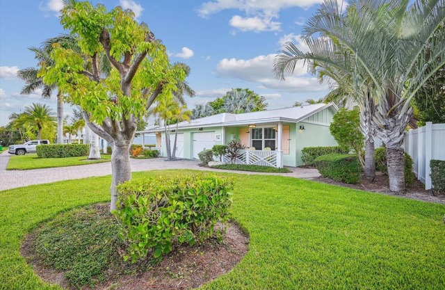 Two Bedroom Cottage with Tropical Landscaping Surrounding Private Heated Pool!