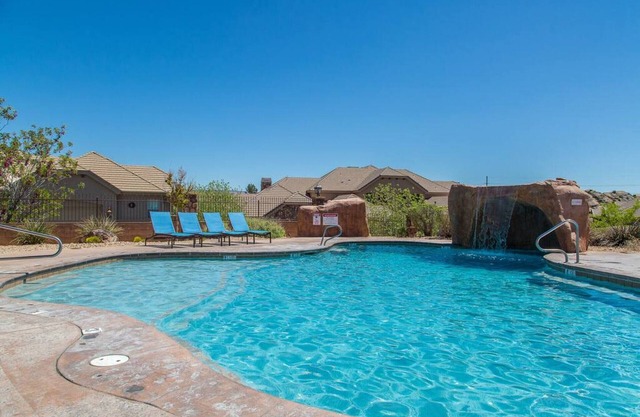 Two heated pools/spas, pond, backyard w/BBQ