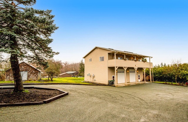 Two-home property with two full kitchens, fast WiFi, fireplace, & washer/dryer
