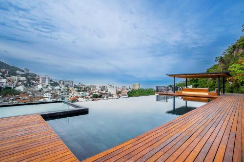 Two Pools, Bar & Gym | Casa Medianoche at Oasis