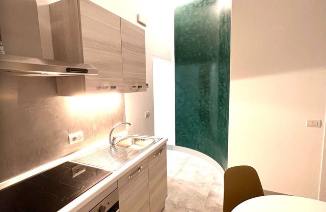 Ubertini House color and charm in a two-room apartment