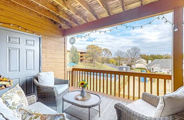 Updated condo with covered balcony, on-site pools, golf, tennis, & grills